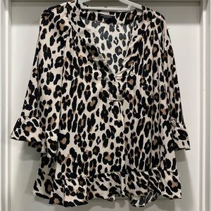 Gorgeous leopard print flouncy blouse.